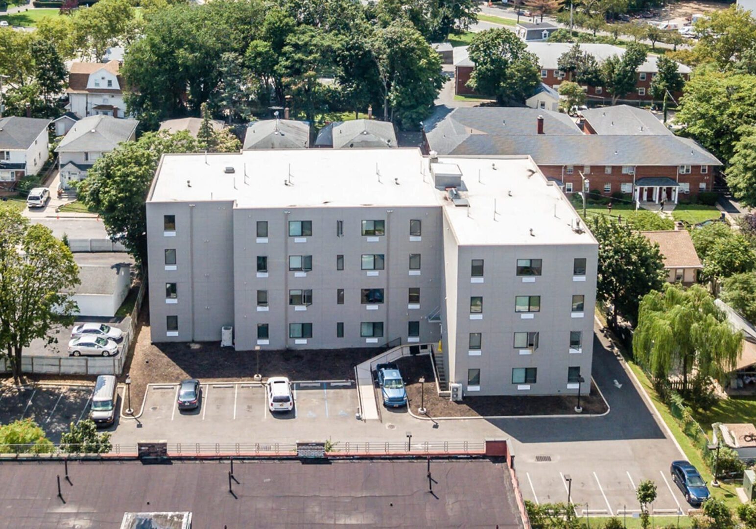 Aerial view of a multi-story apartment building.